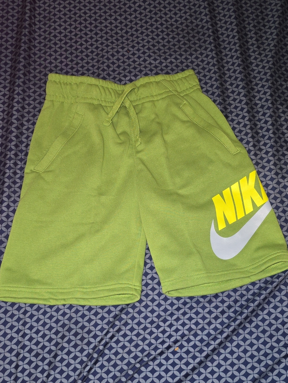 Nike Lime Green Boys' Athletic Shorts with Yellow Logo and White Swoosh